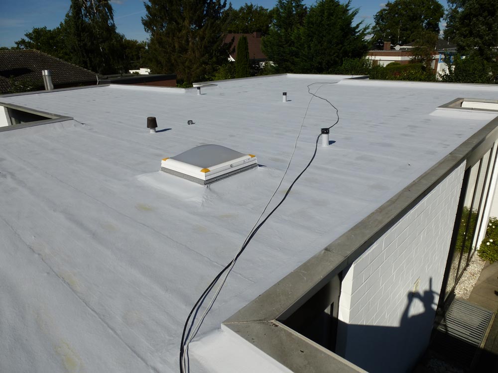 Roof renovation with liquid plastic on bungalow