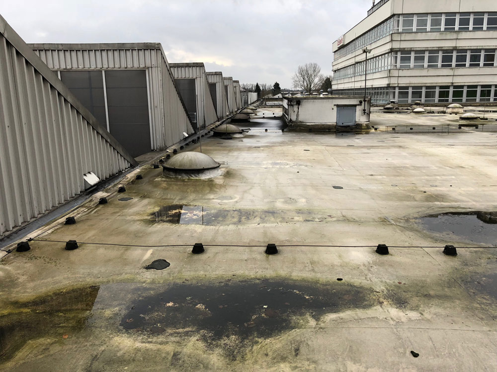 Flat roof renovation old condition